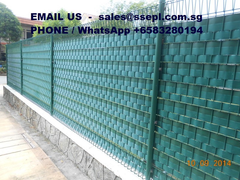 Fence with plastic strips. Singapore Specialized Engineering Pte ltd