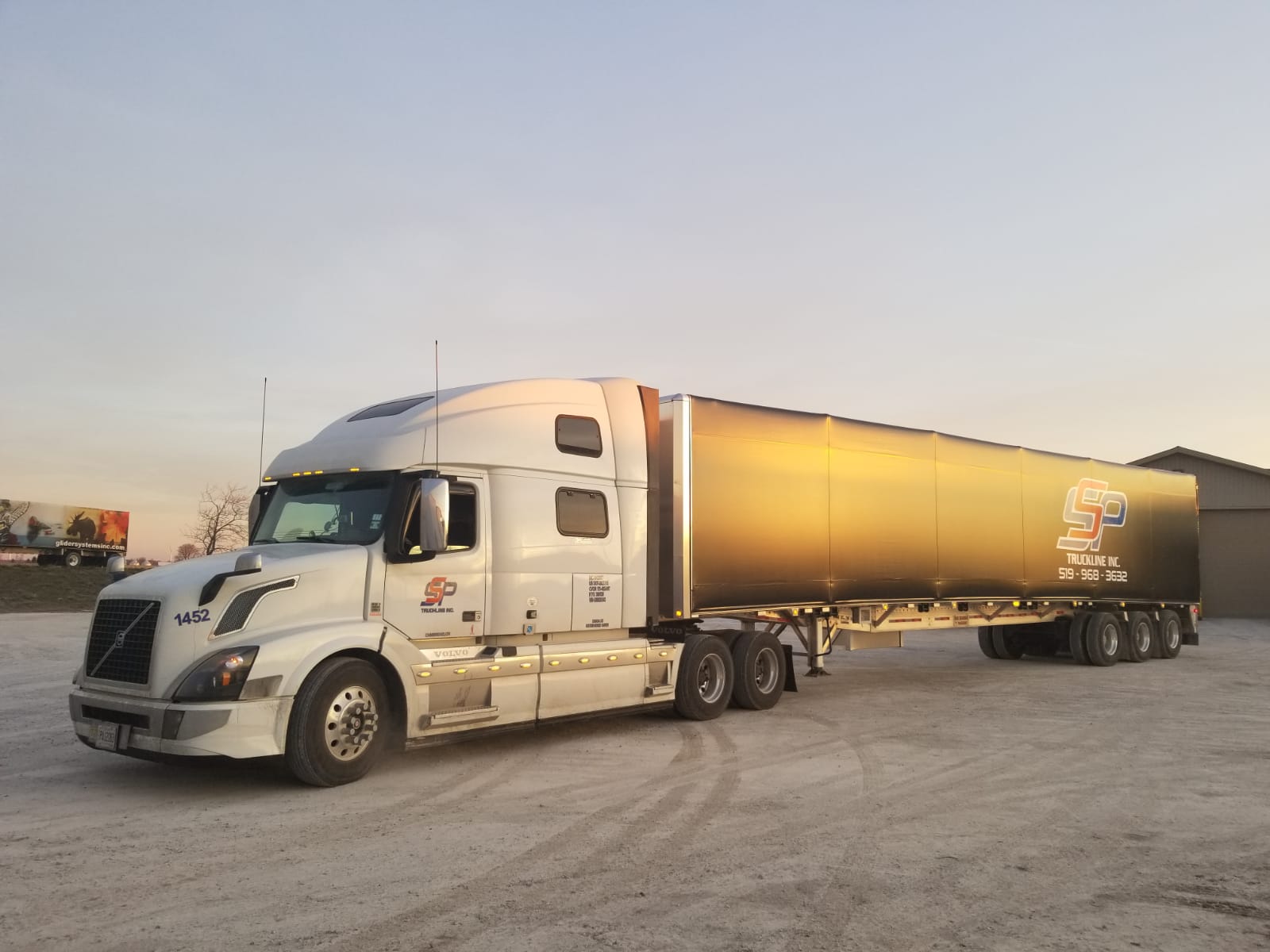 RollTite/Conestoga Trucking Company in Milton Flatbed, RGN