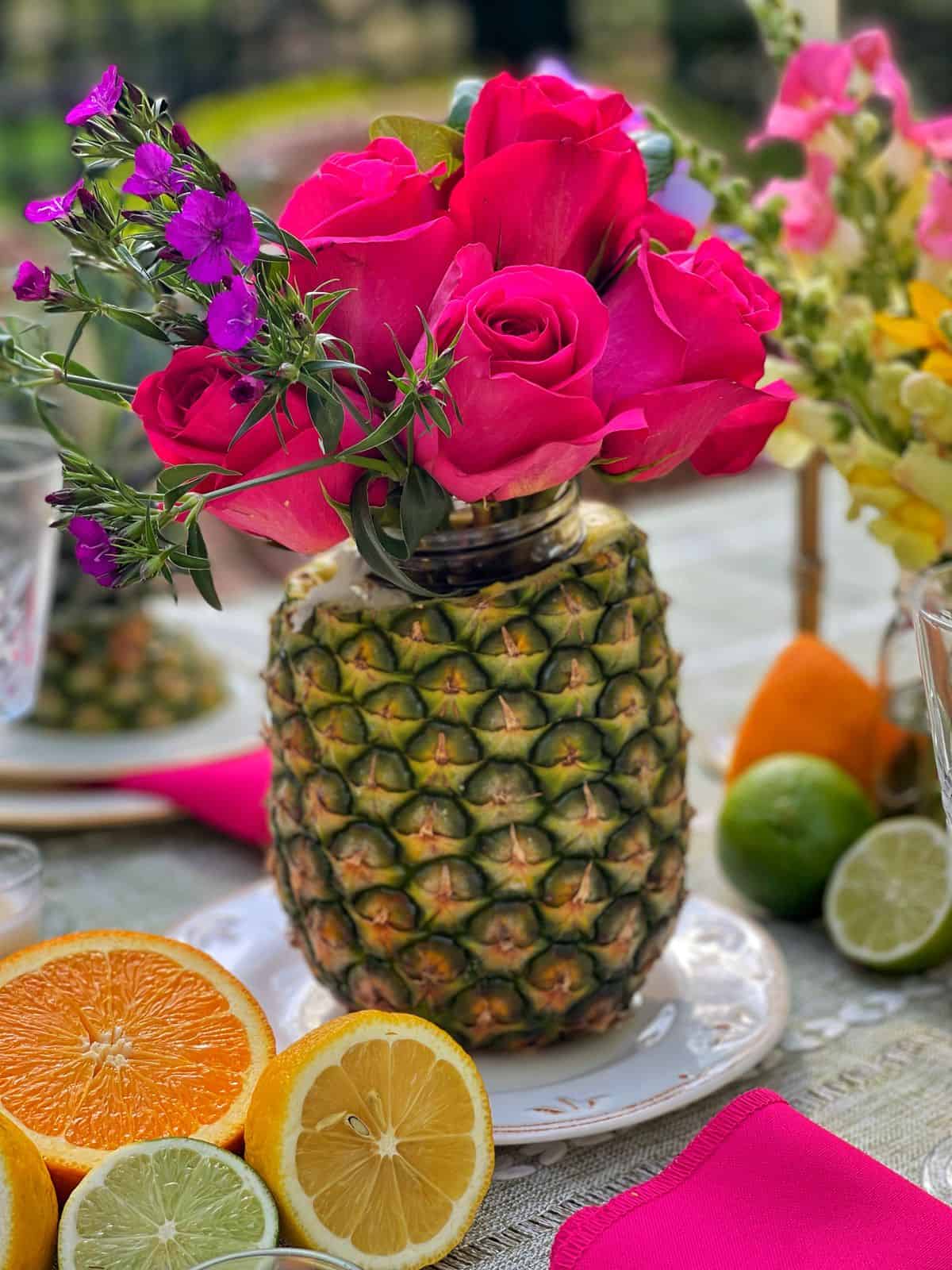 Easy DIY Summer Centerpiece with Flowers and Pineapples Stacy Ling
