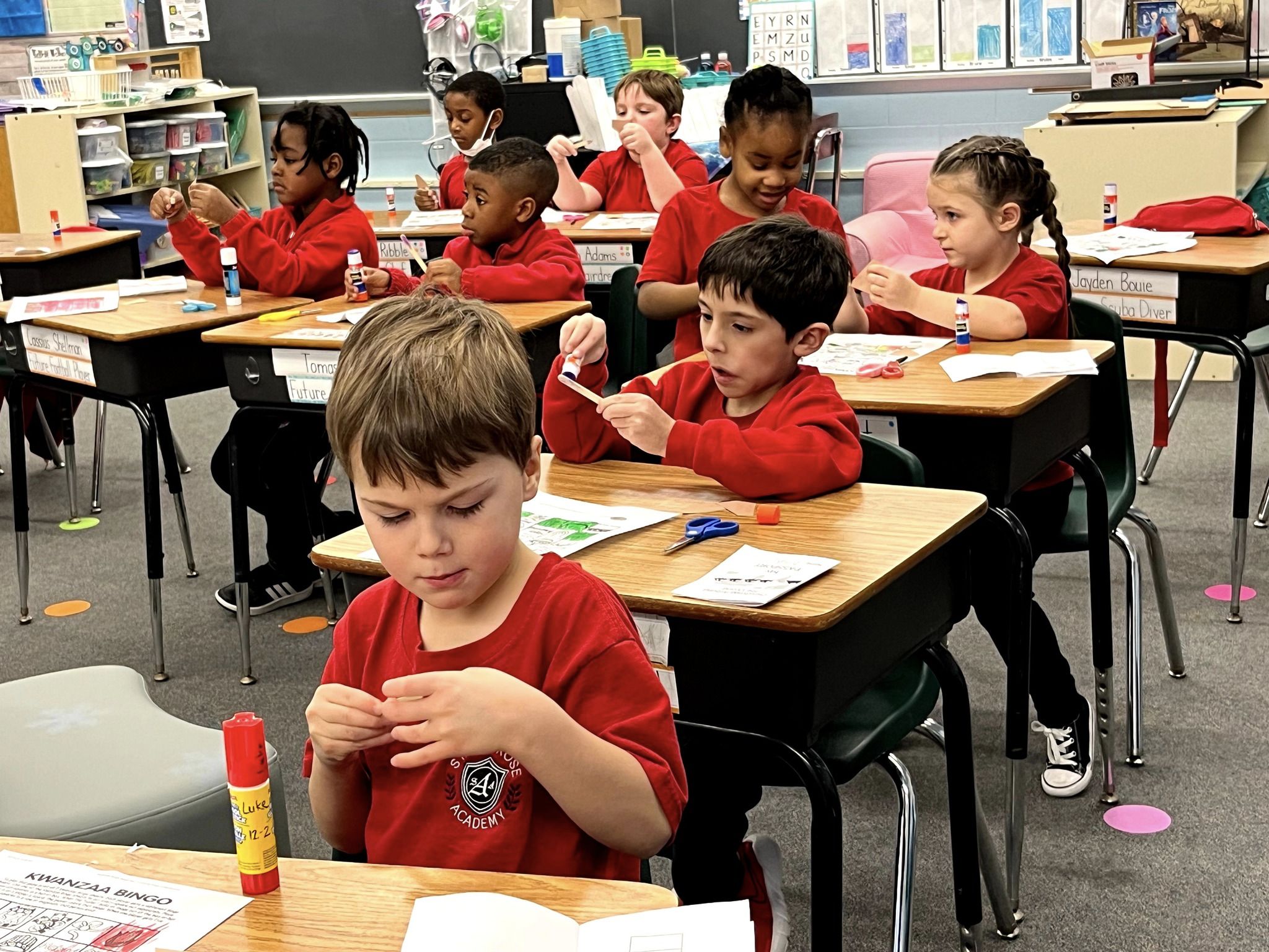 St. Ambrose Academy "Bee" the Reason someone Smiles!