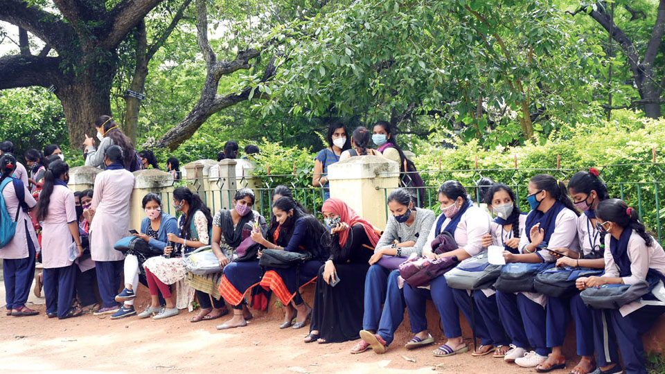 Students back in Colleges Star of Mysore