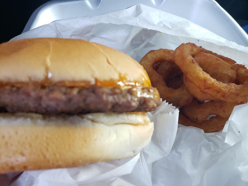 Burger with boom boom sauce and onion rings at The Northlakes Drive-In along County SS - historic U.S. 53 - in Chetek, Wisconsin