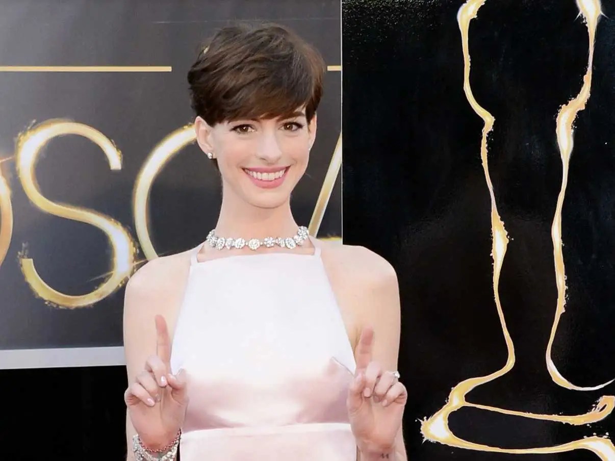 Why Anne Hathaway Was Wearing A Dress That Made It Look Like She Had A