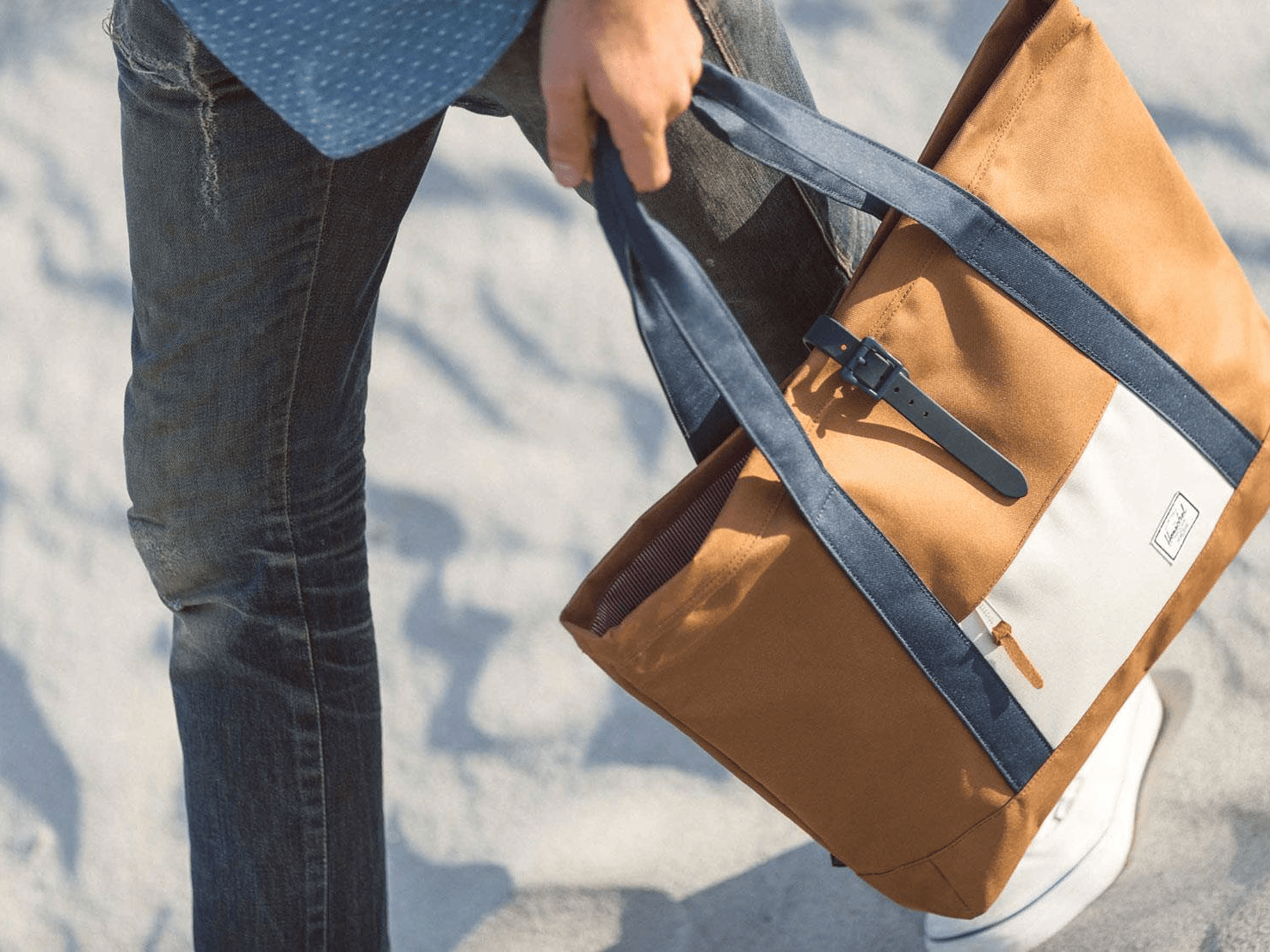 Men are replacing their briefcases with an item once thought only for