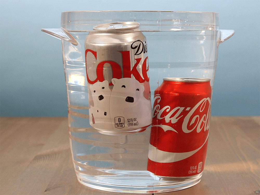 Here's why a can of Diet Coke floats but a regular Coke sinks