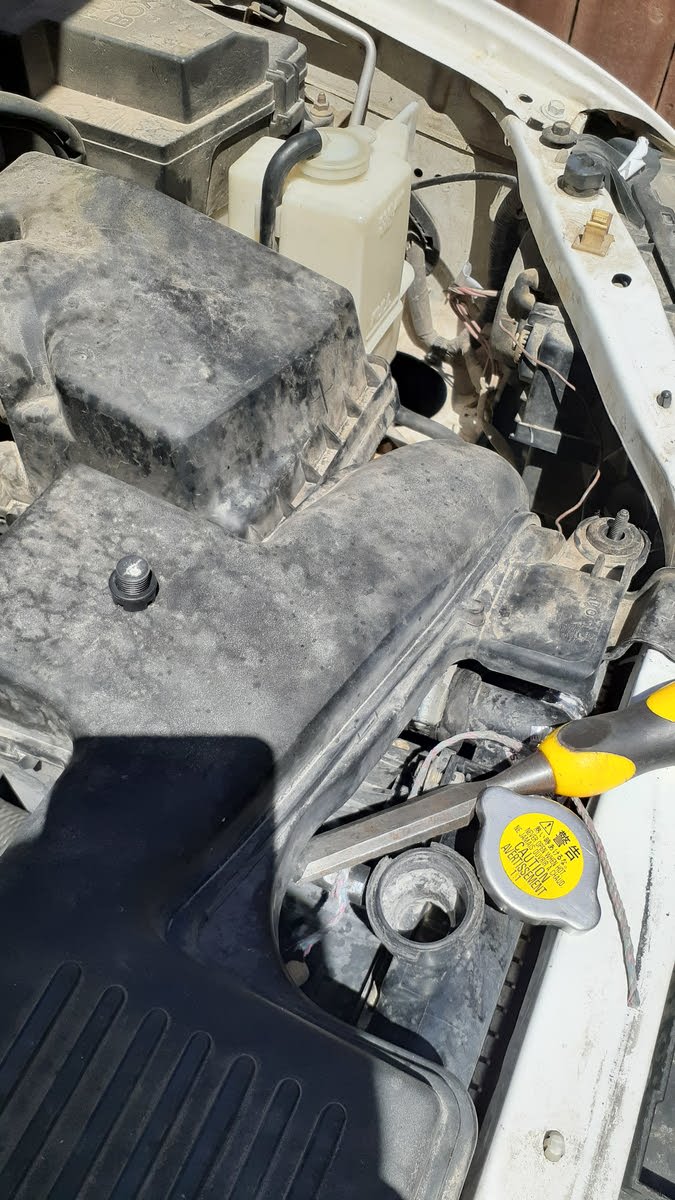 Mazda Protege Questions Do I fill the radiator with new coolant or