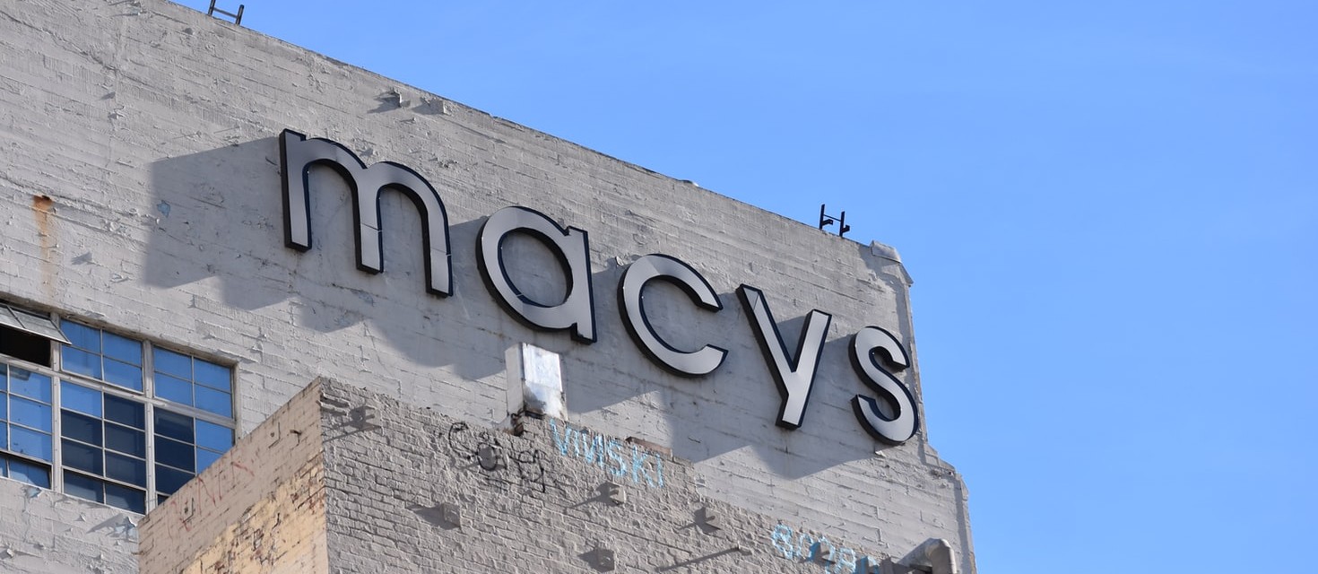 What symbol does the Macy's logo contain?