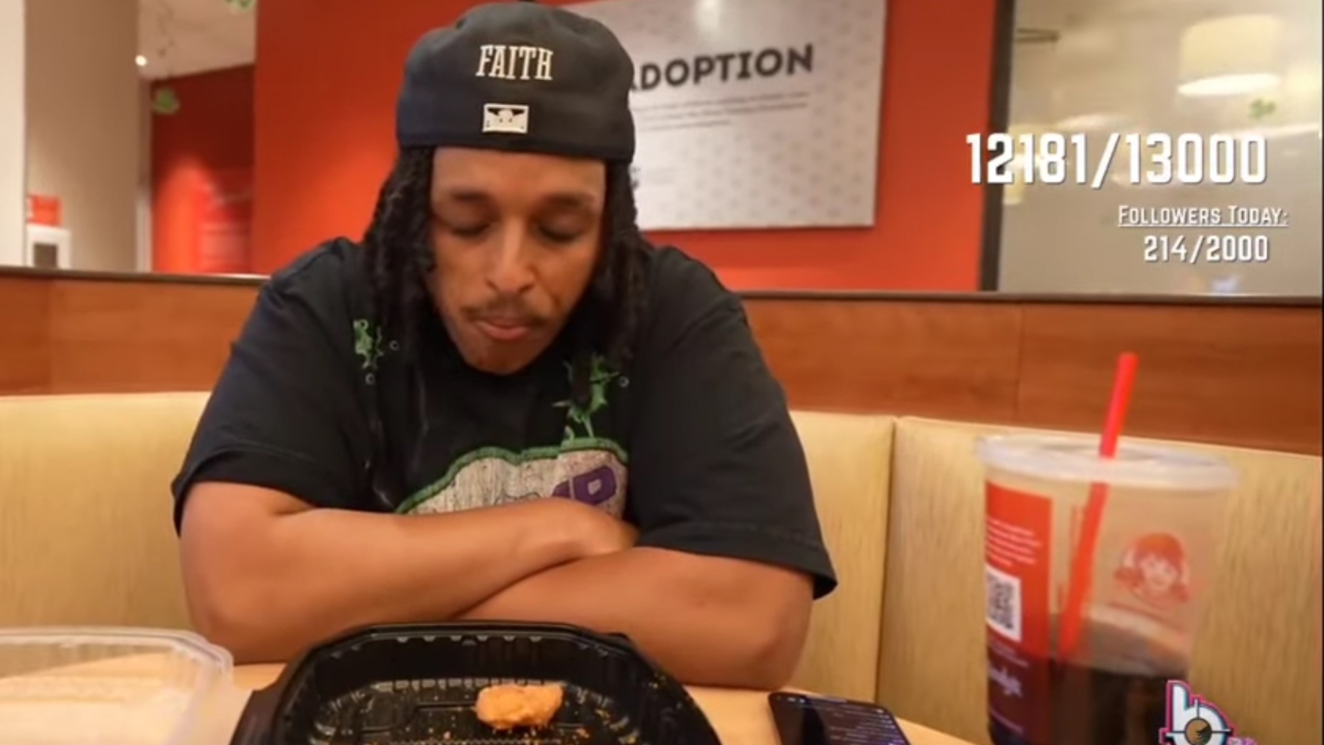 Agent 00 during the Katchii’s spicy chicken nuggets challenge. (Image via @Agent00/ YouTube)