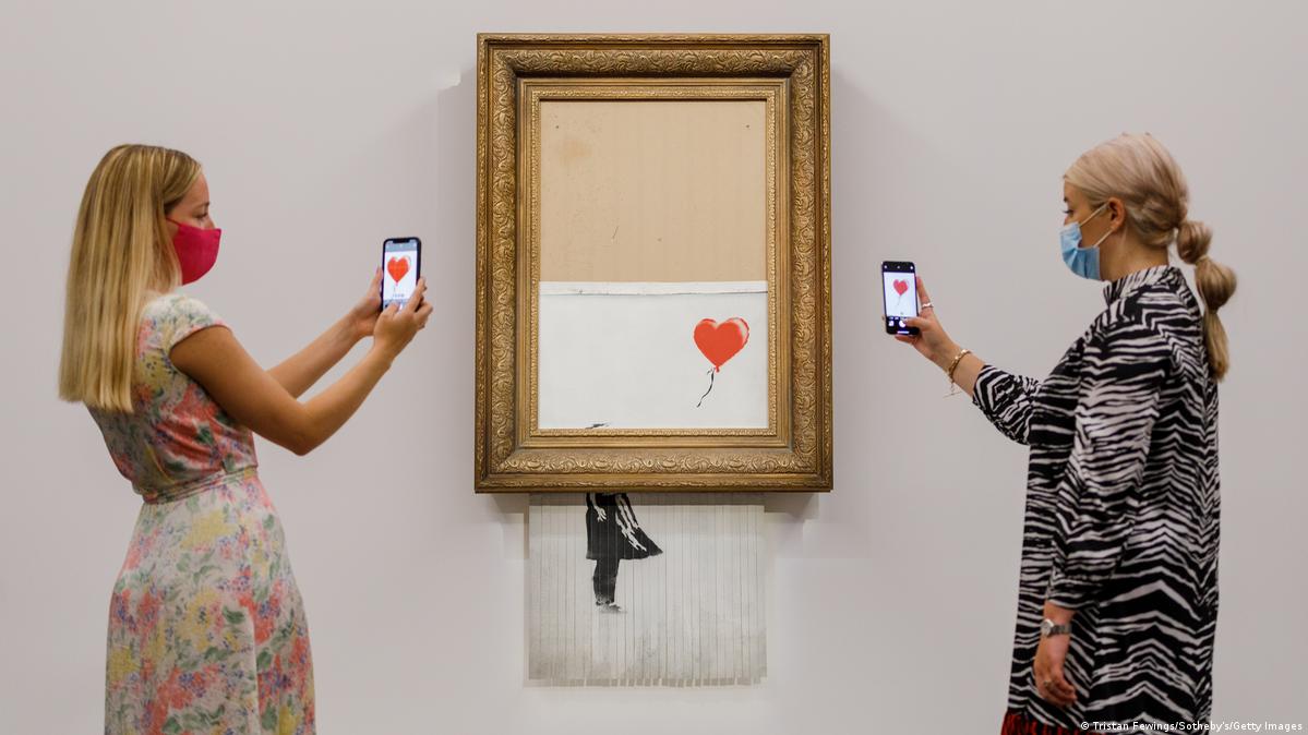 Banksy shredded artwork sells for over 25 million DW 10/14/2021