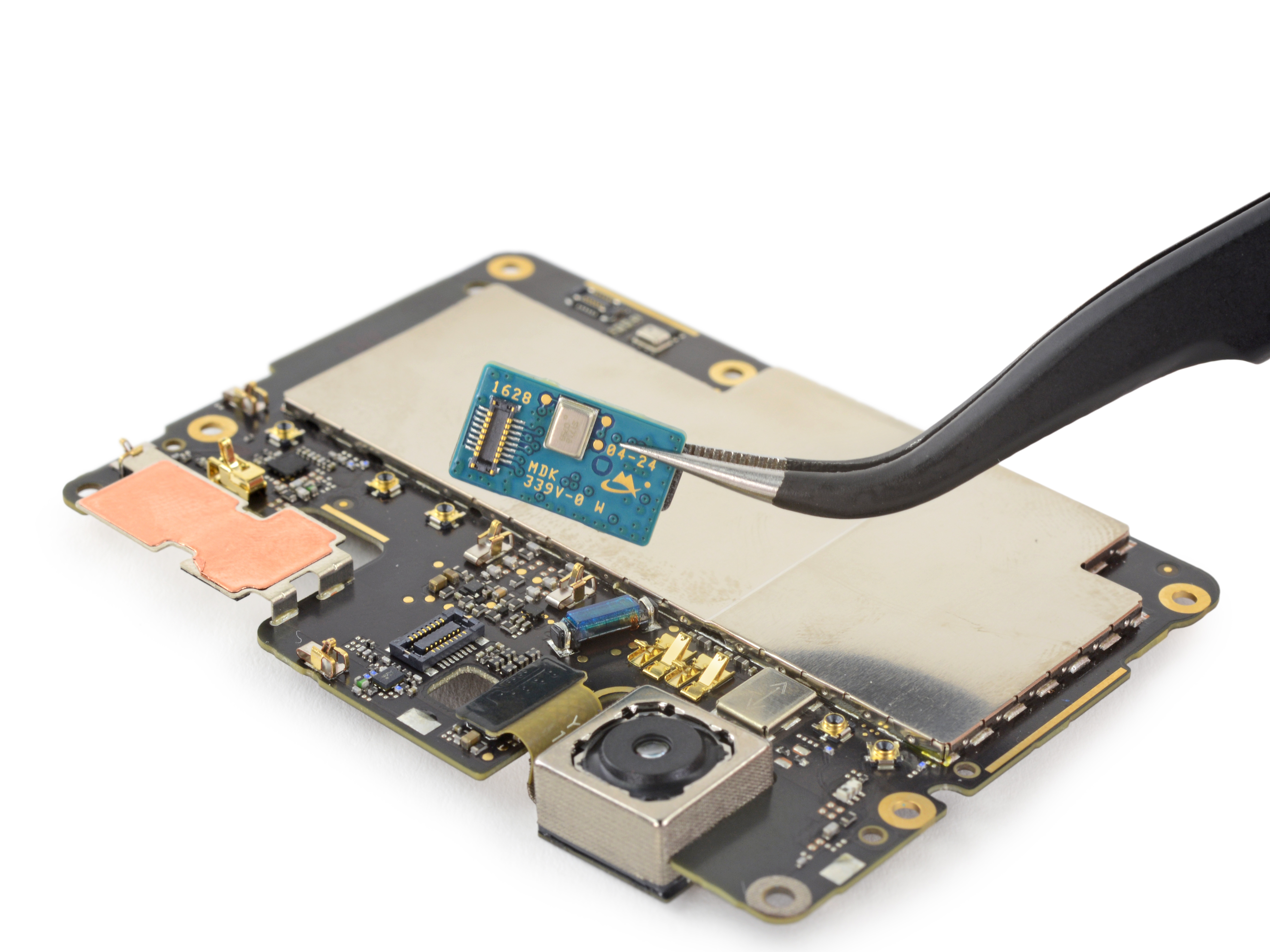 iFixit Toolkit opens a green Christmas present