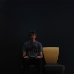 joel chair and blue wall