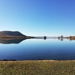 Reflections on the dam at Sani Valley Lodge, South Africa