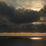 Burning Gold in the Ocean