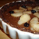 raw chocolate mousse torte with gingered pears in a cherry-chocolate crust
