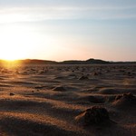 Big empty beach at sunset