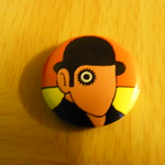 clockwork orange themed badge