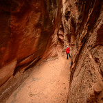 marybeth exploring a slot canyon