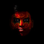 Man With Traditional Makeup On His Face For Theyyam Ceremony, Thalassery, India