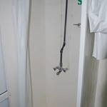 Small shower stalls.....you butt is either going to be against the shower curtain or the cold faucet HA