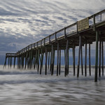Waves Passing Under the Pier