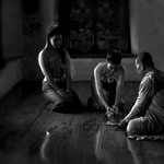 Performing the Tamboon --Ayuthaya , Thailand