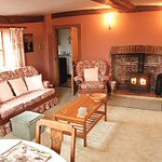 cosy living room with woodburner