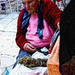 Elderly Woman Behind The Counter In A Small Town