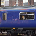Caledonia Sleeper logo on 73971 seen through 321901 at Doncaster