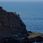 People On Top of Sea Cliff