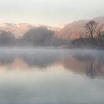 Misty autumn morning on Windermere lake