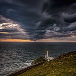 As night falls, South Stack shines