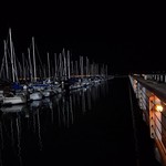 nightime pier reflections