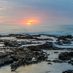 Sunrise Seascape and Rocky Headland