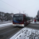 Lothian 136 in snowy conditions on Princes Street, Edinburgh.