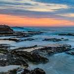 Sunrise Seascape and Rocky Headland
