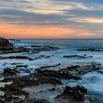 Sunrise Seascape and Rocky Headland