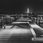 An evening scene of a river landscape in the Netherlands at the town of Deventer