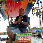 A long boat trip from Tha Tien Ferry terminal in 2010, Taling Chan Floating Market, Taling Chan District, Bangkok, Thailand.