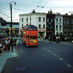Trolley buses in Ilford Lane at the junction with Roden Street in the late 1950's.