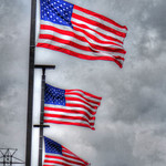 Four flags waving