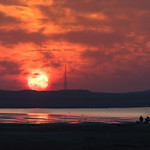 &ldquo;A sunset is the sun&rsquo;s fiery kiss to the night.&rdquo; ― Crystal Woods