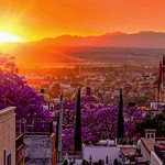 Ocaso Iluminando la Parroquia de San Miguel Arcangel y...