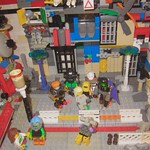 Classic Space: Miss Gray gets free from pilot duty early and waits outside krrr-zzzZx-Murschzz&acute;s apartment and is confronted by Nasty Cyborg ganger (Undercity hive world AFOL sci-fi LEGO MOC vignette) bricks and block toy hobby