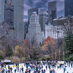People skating on the ice at Wollman Skating Rink in Central Park, New York City