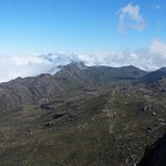O morro do Couto (Hill of Couto) from the Summit of Pico das Agulhas Negras ('Black Needles Peak') at 2,791 m (9,157 ft) MSL, Rio de Janeiro and Minas Gerais States, Itatiaia National Park, Brazil.