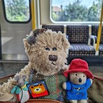 Frīda, Matilda and Paddington are travelling to .. Paddington