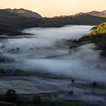 Fog fills the valley