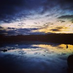 At the Blue Lagoon - waiting for someone to walk pass so that I can take a photo of it ......#iceland #blue #lagoon #blue lagoon #landscape #waterscape #clouds #reflections #water #sunset #sky #trip #tones #rocks #travel #nature