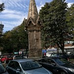 Cars parked around The Martyrs Memorial
