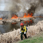 Firefighter conducting burnout operations
